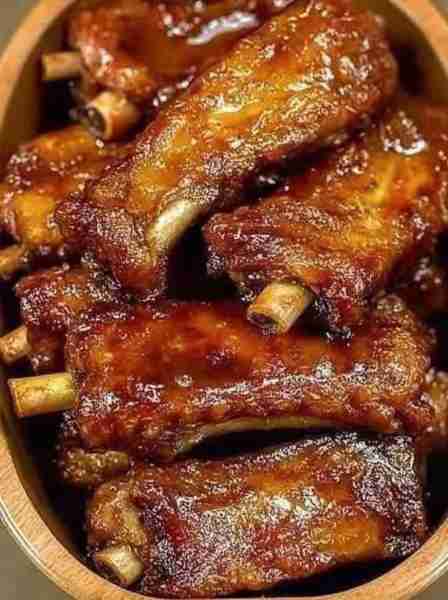 Happiness is best served Slow Smoked & Sauced♨️ 👩🏻‍🍳🌶 Honey Garlic Ribs 🤤Don't LOSE this recipe...