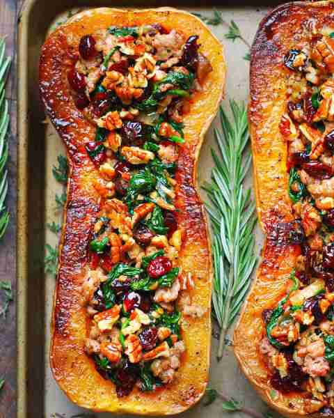 Sausage Stuffed Butternut Squash with Spinach, Pecans, and Cranberries. 🧡🧡