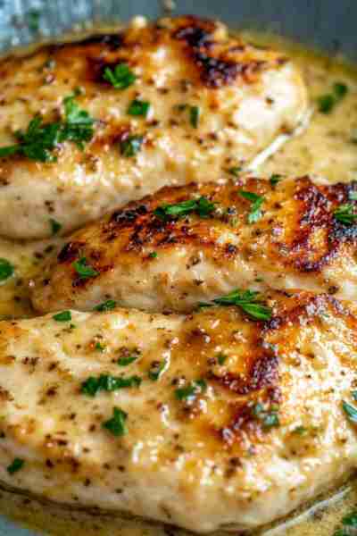 Pan-Seared Chicken Breasts in Garlic Cream Sauce Ingredients: For the Chicken: 4 boneless, skinless...