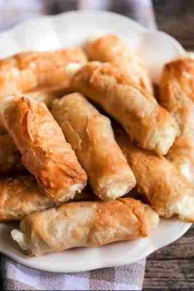 If you’re a fan of Greek food, you’re going to love these Cheese Pie Rolls, also known as Tyropita R...