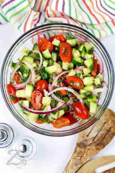 Fresh cucumber and tomato salad is dinner, picnic, or potluck-ready in minutes. A colorful blend of...