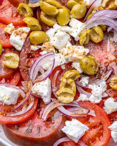 Savor the pure, fresh taste of spring and summer with this effortless Sliced Garden Tomato Salad – s...