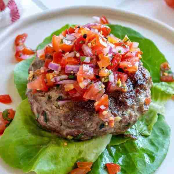 Juicy, tasty burgers topped with Chunky Salsa speak my kind of food love language! Full of fresh her...