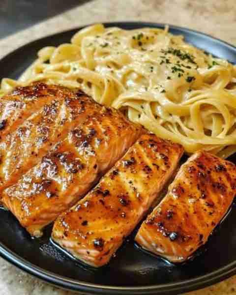 Cajun Honey Butter Salmon Bites Over Cheesy Creamy Linguine Ingredients: 4 salmon fillets, cut into...