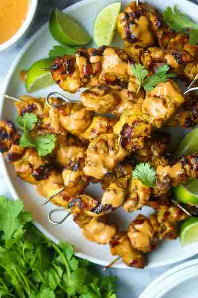 Chicken Satay with Peanut Sauce - Perfectly grilled chicken satay skewers in the most flavorful mari...