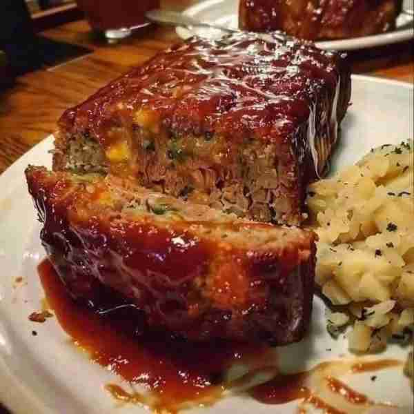 "I've made meatloaf for years but never thought it was memorable. This recipe is! I had my neighbors...