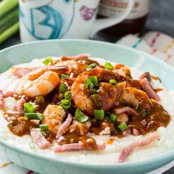 Shrimp and Grits with Red-Eye Gravy is a fun twist on traditional Shrimp and Grits. The sauce is bas...