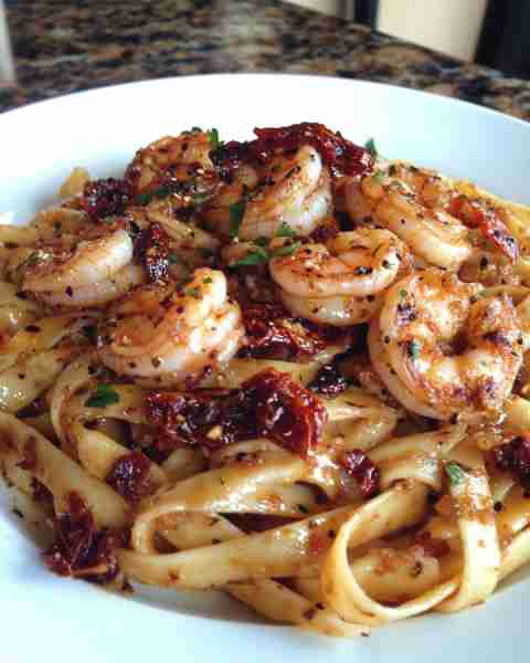 Sun-Dried Tomato Shrimp with Garlic Fettuccine Juicy Sun-Dried Tomato Shrimp Tossed with Creamy Garl...