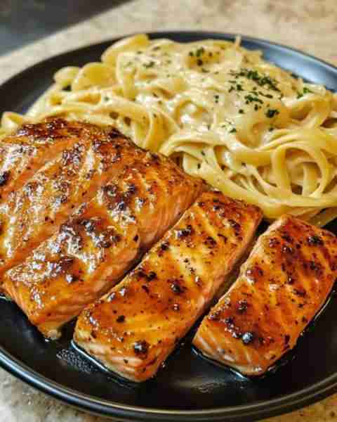 Cajun Honey Butter Salmon Bites Over Cheesy Creamy Linguine Ingredients: 4 salmon fillets, cut into...