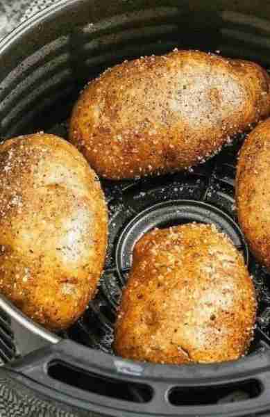 Air Fryer Baked Potatoes Enjoy perfectly crispy-skinned baked potatoes with a fluffy inside, all mad...
