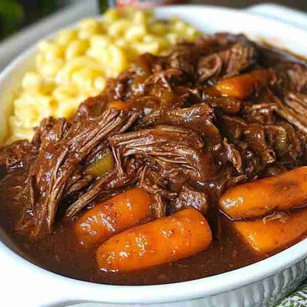 Classic Pot Roast with Carrots and Mac and Cheese . Ingredients: For the Pot Roast: 3–4 lb chuck roa...