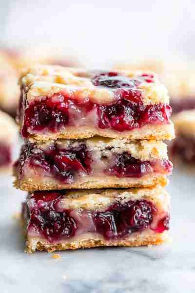 Christmas Cherry Bars I love whipping a tray of these Christmas bars up! Everyone was thrilled by th...