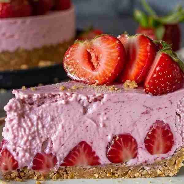 Savor the sweetness of summer with a slice of this no-bake Strawberry Fields Cheesecake! A symphony...
