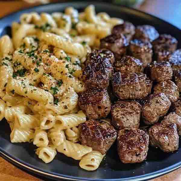 Garlic Butter Steak Bites with Creamy Parmesan Pasta 🥩🧄🧀🍝 Juicy steak bites paired with velvety,...