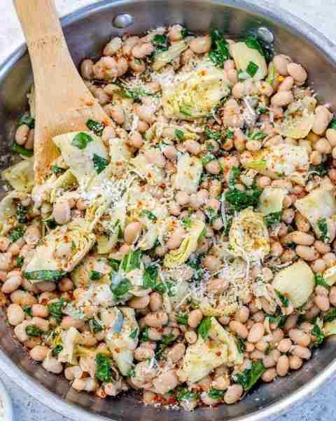 Get ready for a flavorful fusion of creamy beans, earthy greens, and tangy artichokes – a surprising...