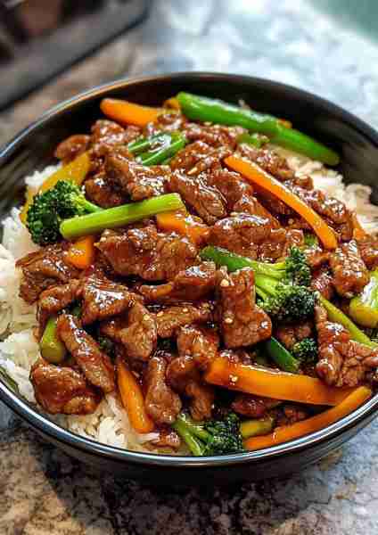 🥩🥢 Savory Beef Stir-Fry—a classic dish featuring tender strips of beef and crisp-tender vegetables...