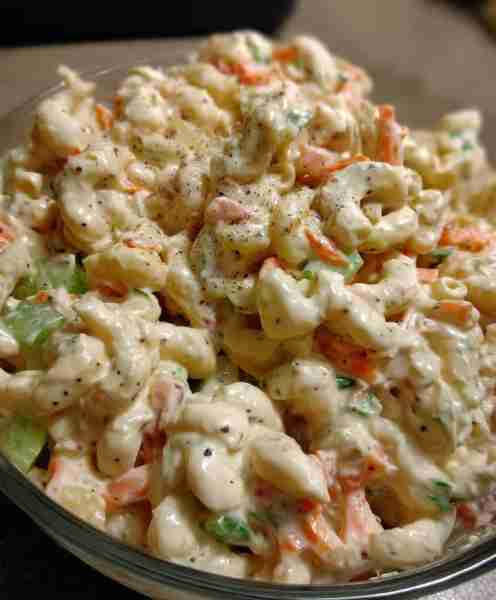 This Easy Macaroni Salad recipe is the perfect side dish to bring to Summer BBQ's, parties and more!...
