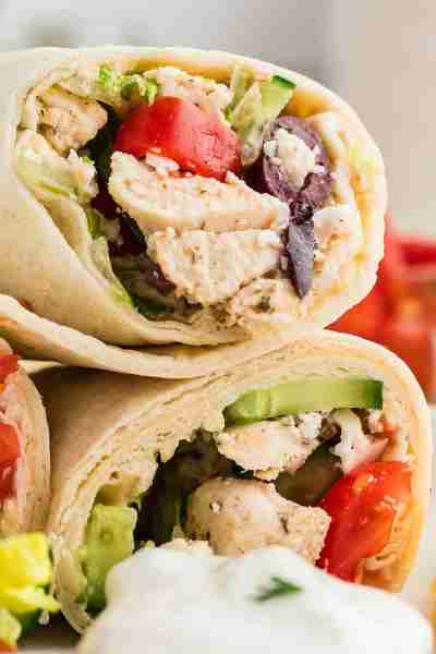 These Greek chicken wraps start with our tender, flavorful, marinated Greek chicken and loads of fre...
