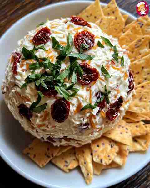 Savory Sun-Dried Tomato and Olive Cheese Ball Ingredients: - 16 oz cream cheese, softened - 1 cup sh...