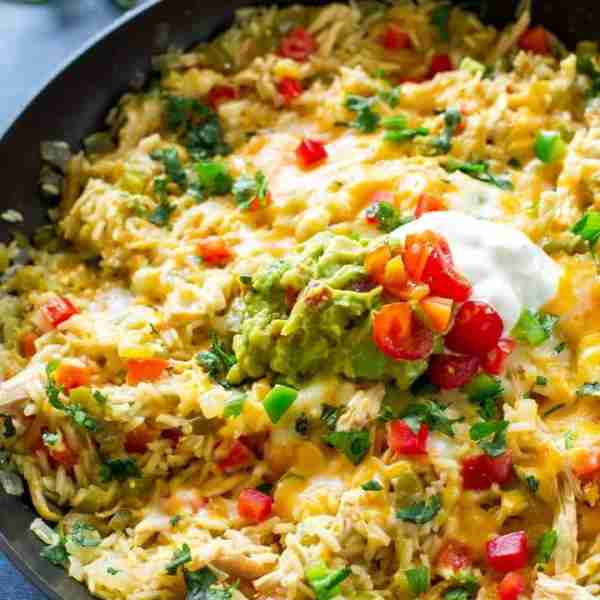 This One-Pan Chicken Fajita Rice is a quick and easy dinner packed with chicken, rice, cheese, peppe...