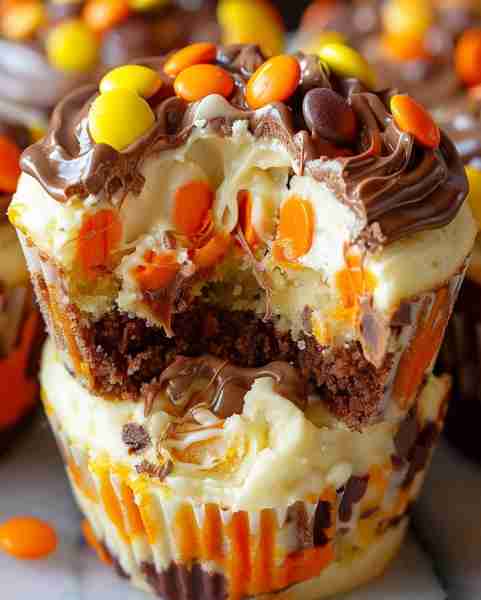 Peanut Butter Cup Cheesecake Swirl Cupcakes Ingredients: 1 cup graham cracker crumbs 2 tablespoons m...