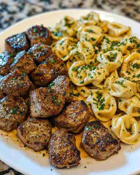 Garlic Butter Steak Bites with Garlic Sauce & Tortellini Ingredients: 1.5 pounds sirloin steak, cut...