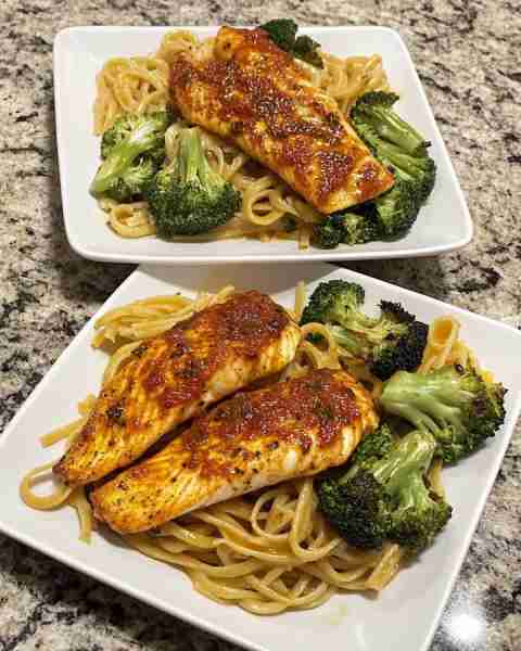 Paprika Tilapia with Broccoli and Herb Pasta Tender Paprika Tilapia over Fresh Broccoli and Herb-Inf...