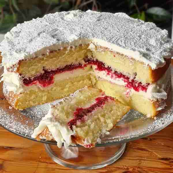Coconut and Raspberry Cake Ingredients: For the cake: - 3 medium eggs (beaten) - 50g desiccated coc...