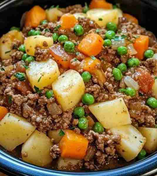 Slow Cooker Hamburger Hash 🍔🥔✨ Get ready for a warm and hearty meal that practically cooks itself...