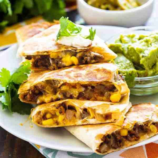 Ground Beef Quesadillas - taco-seasoned ground beef, corn, lots of gooey melted cheese, and a crispy...