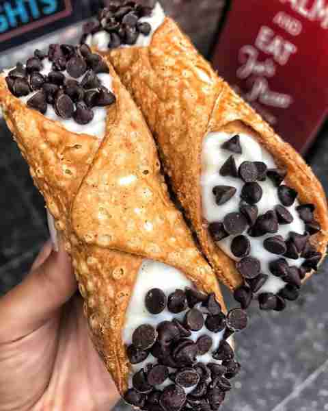 Classic cannoli filled with ricotta cream and topped with chocolate chips. Ingredients: For the Cann...