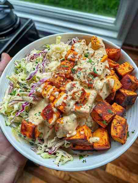 🌱🔥✔️ Buffalo Ranch Tofu with Roasted Garlic Sweet Potatoes & Slaw—a vibrant and flavorful plant-ba...