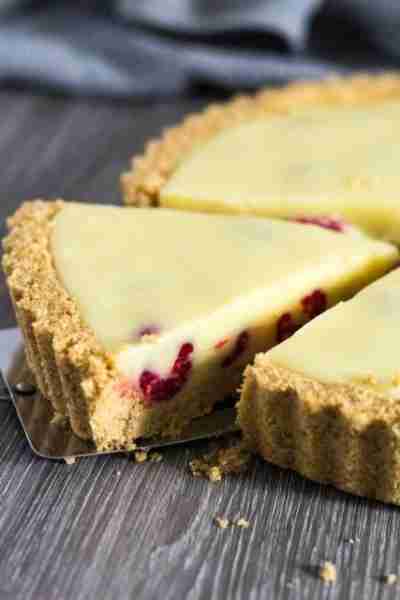 Indulge in this heavenly White Chocolate Raspberry Tart - a delightful blend of sweet white chocolat...