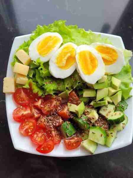 Power Salad Bowl 1. Layer fresh lettuce leaves as the base. 2. Top with sliced boiled eggs, cubed ch...