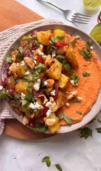 One for my potatoes & dip lovers! A sun-dried tomato hummus with a tray of roasted potatoes, Mediter...