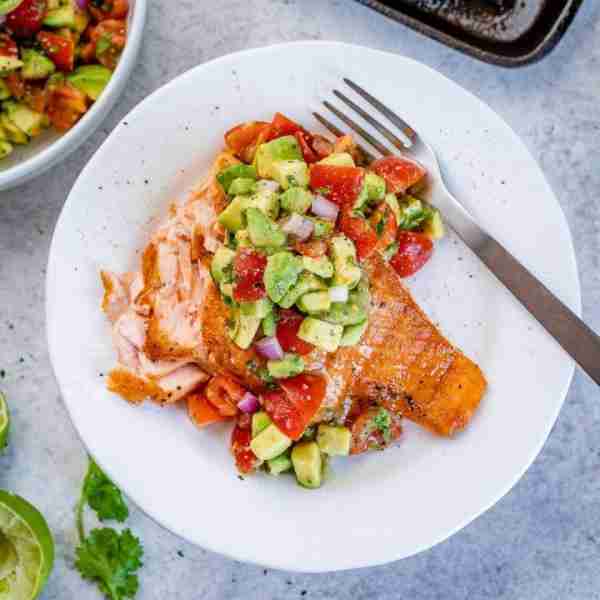 This Grilled Salmon + Avocado Salsa recipe is one of my all-time FAVORITE ways to enjoy salmon! Drip...