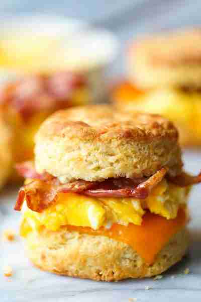 Make Ahead Breakfast Biscuit Sandwiches - Oh-so-warm, flaky buttermilk biscuits with eggs, bacon and...