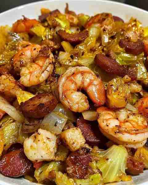 Fried Cabbage with Shrimp, Sausage & Bacon 🥬🍤🥓 Ingredients: 1 small head of cabbage, chopped 1/2...