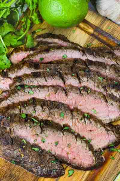 Grilled Flank Steak is marinated and cooked on the bbq until the meat is juicy, tender, and ready to...