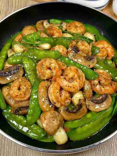Shrimp and Snow Peas Stir-Fry Ingredients: Shrimp, peeled and deveined Snow peas, trimmed Mushrooms,...