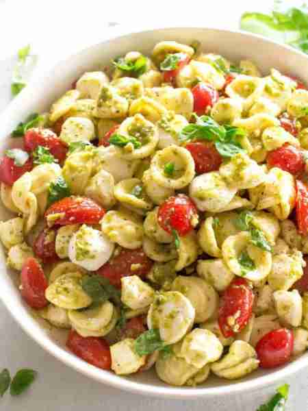 This Caprese Pasta Salad is the traditional Caprese salad in pasta form! Pasta, fresh tomatoes, basi...