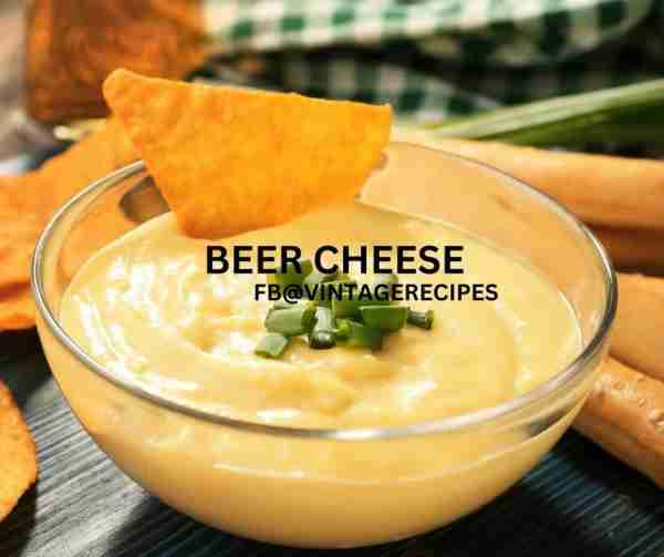 KENTUCKY BEER CHEESE 1 cup beer 1 pound extra-sharp Cheddar cheese, shredded 2 cloves garlic, minced...