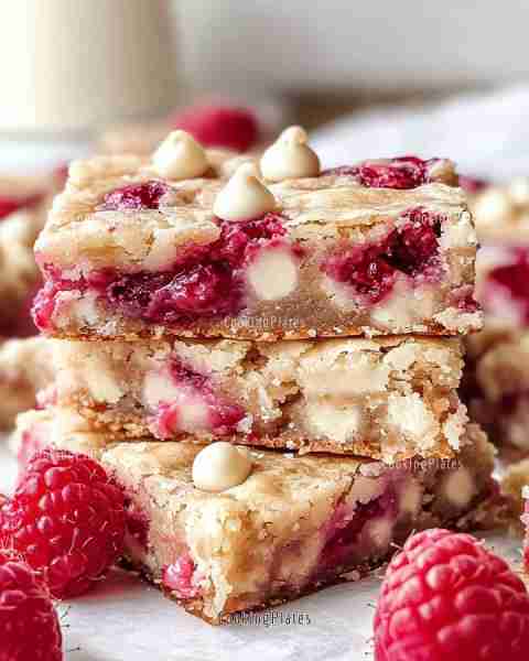 🍓 Raspberry and White Chocolate Blondies 🤍 Sweet, tart raspberries paired with creamy white chocol...