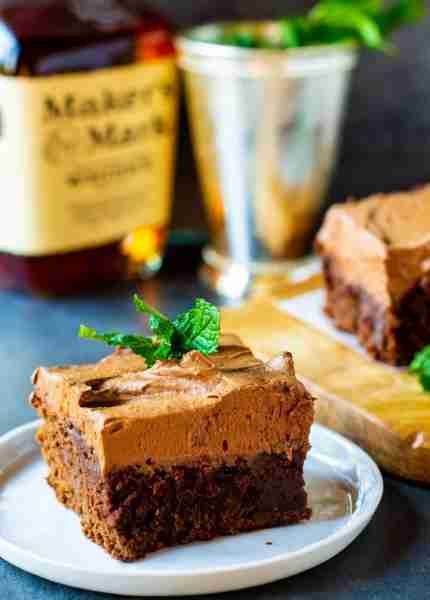 Mint Julep Brownies flavored with bourbon and mint and covered in chocolate frosting are the perfect...