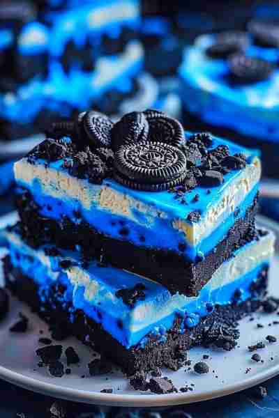 BLUE VELVET OREOS CHEESECAKE BARS Ingredients Crust Layer: 2 cups Oreo cookie crumbs (about 20 Oreos...