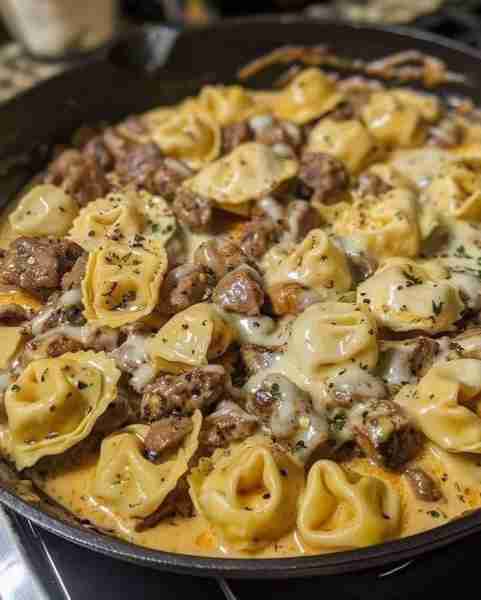 Cheesesteak Tortellini in Rich Provolone Sauce 🍲😍😋 Ingredients: For the Tortellini: 1 lb cheese t...