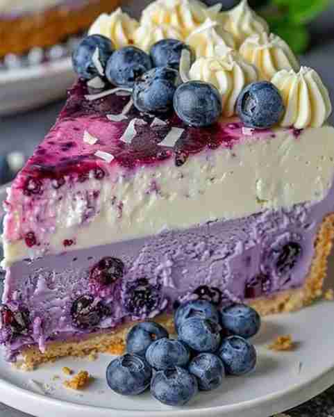 Easy White Chocolate Blueberry Cheesecake Ingredients: 1 1/2 cups graham cracker crumbs 1/4 cup suga...
