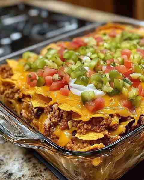 Try this Walking Taco Casserole – a fun twist on taco night that's easy to make and packed with flav...