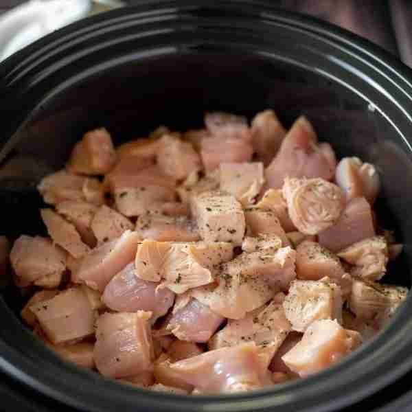 Put diced chicken and brown sugar into a slow cooker for this take-out favorite. I offer you this re...