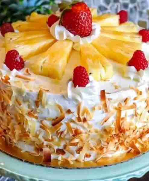 Tropical Piña Colada Delight 🥥 🥚 🍍 🧈 🍳 👩‍🍳 Ingredients: For the Cake: 1 1/2 cups granulated...